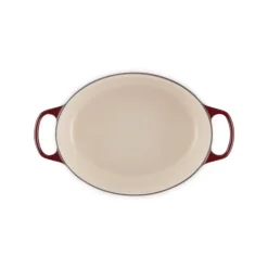 Cocotte en Fonte Ovale 31 cm Garnet Bouton Doré Le Creuset Signature