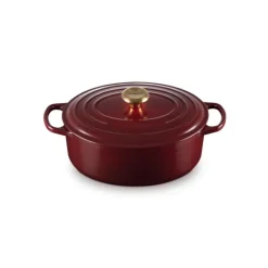 Cocotte en Fonte Ovale 29 cm Garnet Bouton Doré Le Creuset Signature
